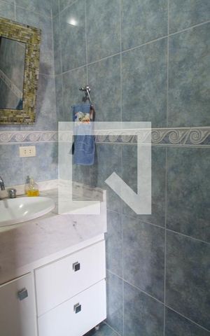 Casa à venda com 400m², 4 quartos e 3 vagasBanheiro da Suíte 1
