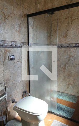 Casa à venda com 400m², 4 quartos e 3 vagasBanheiro da Suíte 4