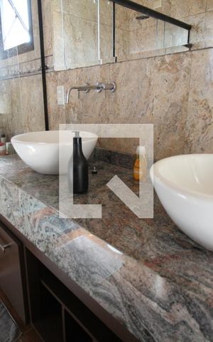 Casa à venda com 400m², 4 quartos e 3 vagasBanheiro da Suíte 4