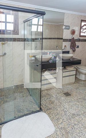 Casa à venda com 459m², 4 quartos e 4 vagasSuite