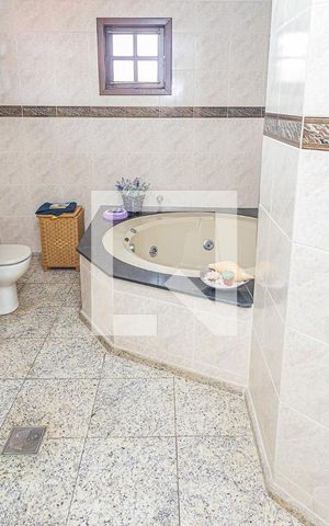 Casa à venda com 459m², 4 quartos e 4 vagasSuite