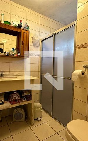 Casa à venda com 300m², 5 quartos e 2 vagasBanheiro 3