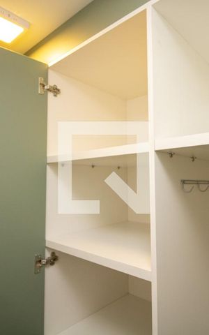 Studio à venda com 34m², 1 quarto e sem vaga Studio à venda com 34m², 1 quarto e sem vagaArmário aberto