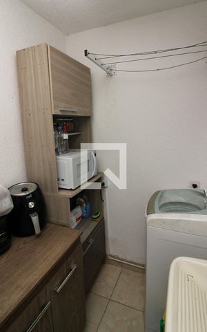Apartamento à venda com 44m², 2 quartos e 1 vaga Apartamento à venda com 44m², 2 quartos e 1 vagaCozinha e Área de Serviço