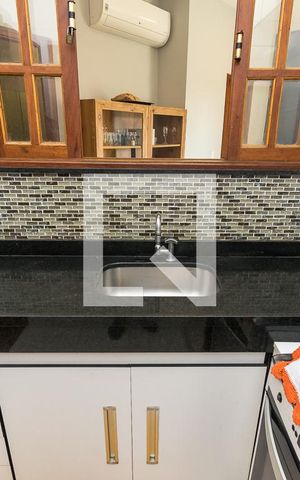 Casa à venda com 128m², 2 quartos e 2 vagas Casa à venda com 128m², 2 quartos e 2 vagasCozinha