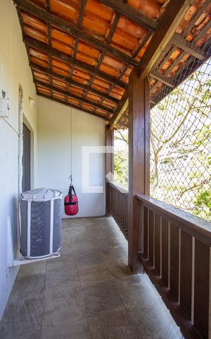 Casa de condomínio à venda com 1000m², 5 quartos e 3 vagasVaranda da Sala