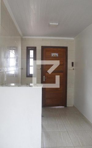 Casa para alugar com 60m², 2 quartos e 2 vagasCozinha