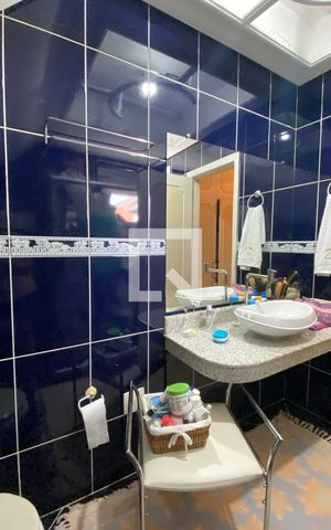 Casa de condomínio à venda com 320m², 4 quartos e 4 vagasBanheiro da Suíte 1