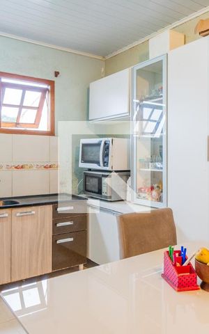 Casa à venda com 50m², 2 quartos e sem vaga Casa à venda com 50m², 2 quartos e sem vagaCozinha e Área de Serviço