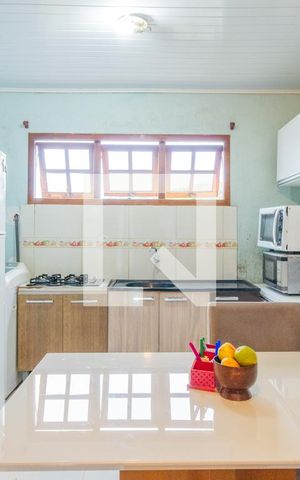 Casa à venda com 50m², 2 quartos e sem vaga Casa à venda com 50m², 2 quartos e sem vagaCozinha e Área de Serviço