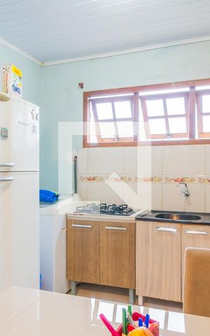 Casa à venda com 50m², 2 quartos e sem vaga Casa à venda com 50m², 2 quartos e sem vagaCozinha e Área de Serviço