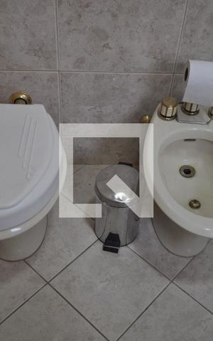 Casa à venda com 420m², 4 quartos e 8 vagasBanheiro da Suíte 2