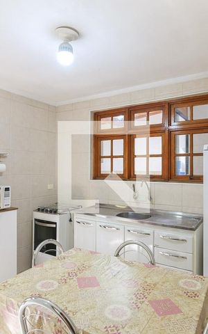 Casa à venda com 63m², 2 quartos e 2 vagas Casa à venda com 63m², 2 quartos e 2 vagasCozinha