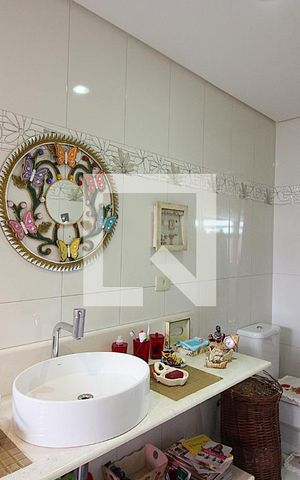 Casa à venda com 204m², 3 quartos e 2 vagasBanheiro do Quarto 1 - Suíte