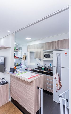 Apartamento à venda com 43m², 2 quartos e 1 vaga Apartamento à venda com 43m², 2 quartos e 1 vagaCozinha e Área de Serviço