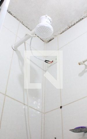 Casa à venda com 158m², 2 quartos e 2 vagasBanheiro do piso superior