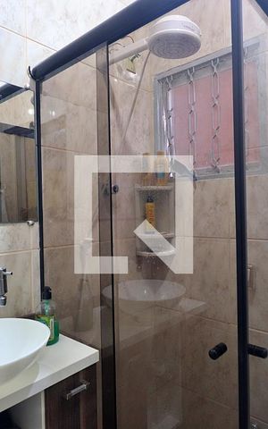 Casa à venda com 173m², 2 quartos e 2 vagasBanheiro do Quarto 1 - Suíte