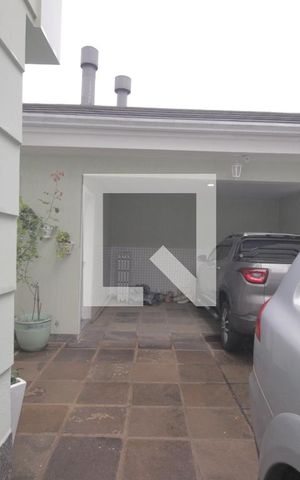 Casa de condomínio à venda com 230m², 3 quartos e 5 vagasGaragem