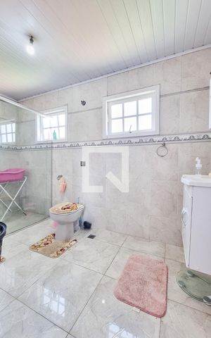 Casa para alugar com 400m², 4 quartos e 10 vagasBanheiro da Suíte 1