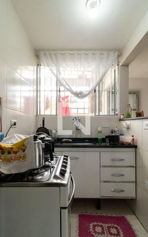 Casa à venda com 60m², 3 quartos e 3 vagas Casa à venda com 60m², 3 quartos e 3 vagasCozinha