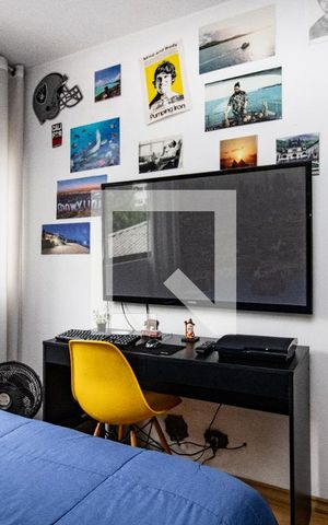 Apartamento à venda com 118m², 3 quartos e 2 vagas Apartamento à venda com 118m², 3 quartos e 2 vagasQuarto 2, mesa de estudos e TV