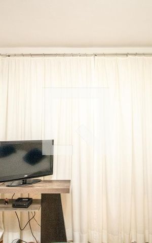 Apartamento à venda com 118m², 3 quartos e 2 vagas Apartamento à venda com 118m², 3 quartos e 2 vagasSuite, cortina e TV