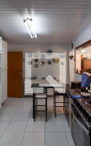 Casa à venda com 170m², 3 quartos e 2 vagas Casa à venda com 170m², 3 quartos e 2 vagasCozinha Americana