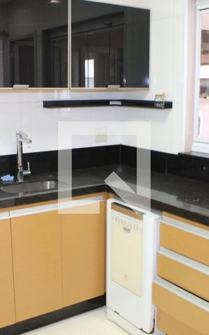 Casa de condomínio para alugar com 180m², 4 quartos e 3 vagasCozinha