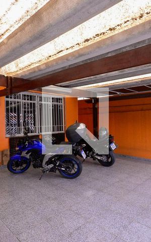 Casa à venda com 352m², 4 quartos e 2 vagas Casa à venda com 352m², 4 quartos e 2 vagasGaragem