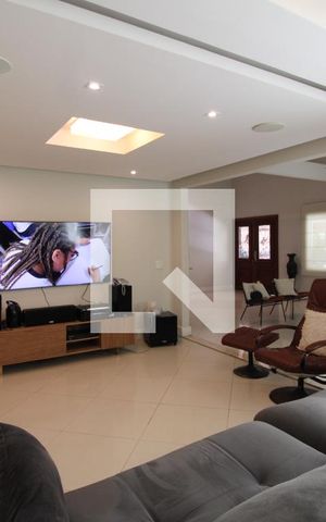 Casa de condomínio à venda com 800m², 5 quartos e 8 vagasSala