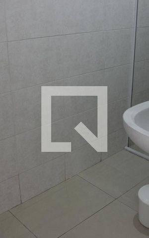 Casa à venda com 164m², 4 quartos e 1 vagaBanheiro na área de lavanderia