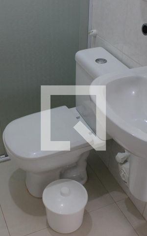 Casa à venda com 164m², 4 quartos e 1 vagaBanheiro na área de lavanderia