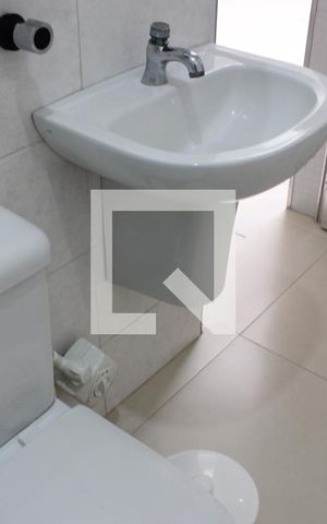 Casa à venda com 164m², 4 quartos e 1 vagaBanheiro na área de lavanderia