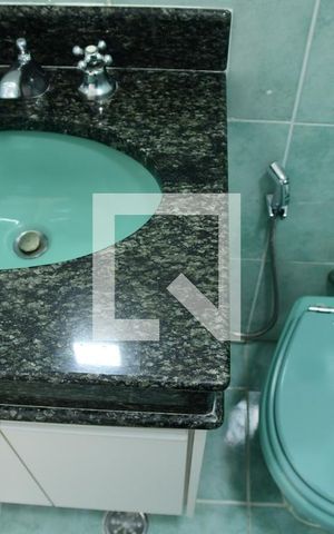 Casa de condomínio para alugar com 340m², 3 quartos e 8 vagasBanheiro da Suíte 2