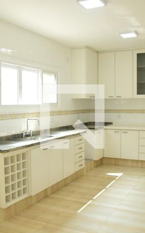 Casa de condomínio para alugar com 340m², 3 quartos e 8 vagasCozinha
