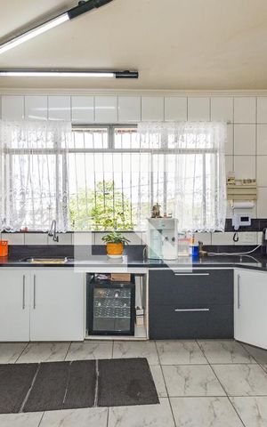 Casa para alugar com 250m², 5 quartos e 4 vagas Casa para alugar com 250m², 5 quartos e 4 vagasCozinha