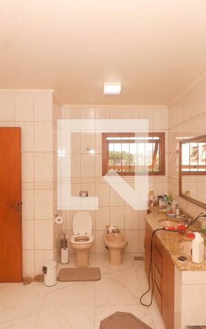 Casa à venda com 400m², 4 quartos e 4 vagas Casa à venda com 400m², 4 quartos e 4 vagasBanheiro da Suíte