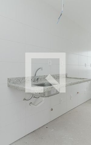 Apartamento à venda com 50m², 1 quarto e 2 vagas Apartamento à venda com 50m², 1 quarto e 2 vagasCozinha e Área de Serviço