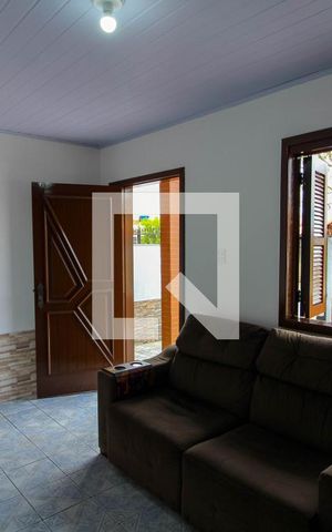 Casa para alugar com 70m², 2 quartos e 2 vagasSala