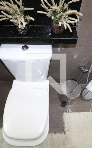 Casa à venda com 350m², 2 quartos e 2 vagasBanheiro da Suíte 1
