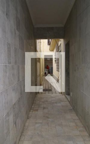 Casa à venda com 329m², 5 quartos e 3 vagasCorredor externo da casa