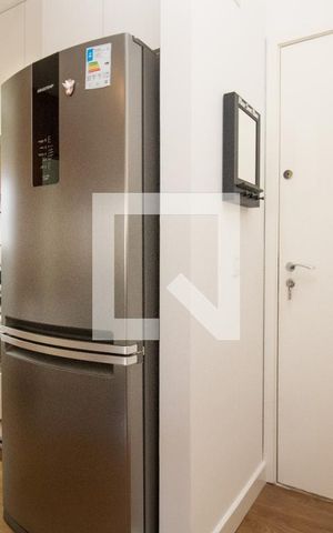 Apartamento à venda com 58m², 1 quarto e 1 vaga Apartamento à venda com 58m², 1 quarto e 1 vagaCozinha americana e porta de entrada