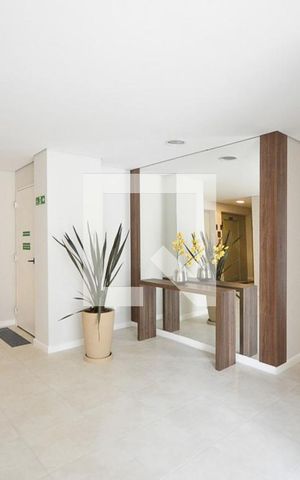 Apartamento à venda com 54m², 2 quartos e 2 vagasHall social