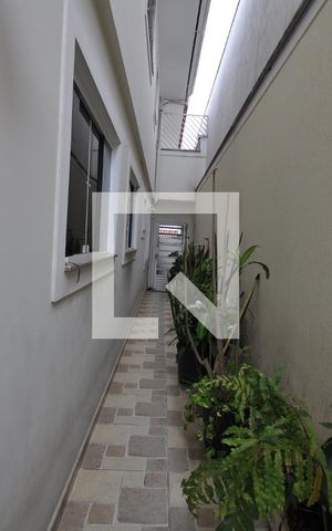 Casa à venda com 164m², 3 quartos e 4 vagasCorredor externo 