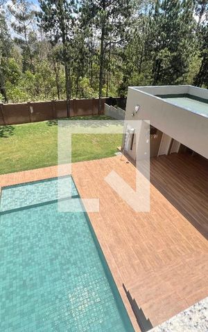 Casa de condomínio à venda com 502m², 4 quartos e 4 vagas Casa de condomínio à venda com 502m², 4 quartos e 4 vagasÁrea Externa