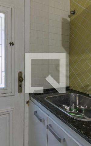 Casa de condomínio à venda com 700m², 6 quartos e 2 vagas Casa de condomínio à venda com 700m², 6 quartos e 2 vagasCozinha e Área de Serviço