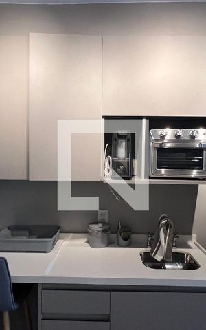 Studio à venda com 31m², 1 quarto e 1 vaga Studio à venda com 31m², 1 quarto e 1 vagaCozinha - Armários
