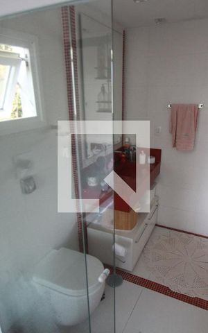 Casa de condomínio à venda com 308m², 4 quartos e 2 vagasBanheiro Suíte 1