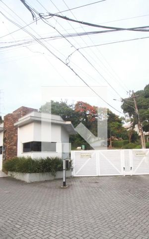 Casa de condomínio à venda com 308m², 4 quartos e 2 vagasFachada Condomínio