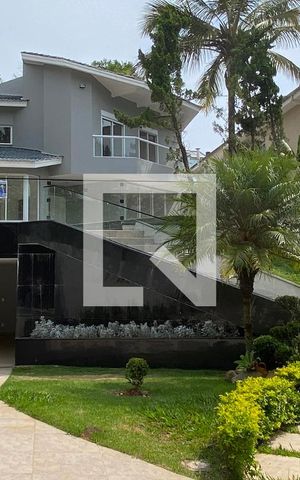 Casa de condomínio à venda com 414m², 4 quartos e 3 vagasFachada